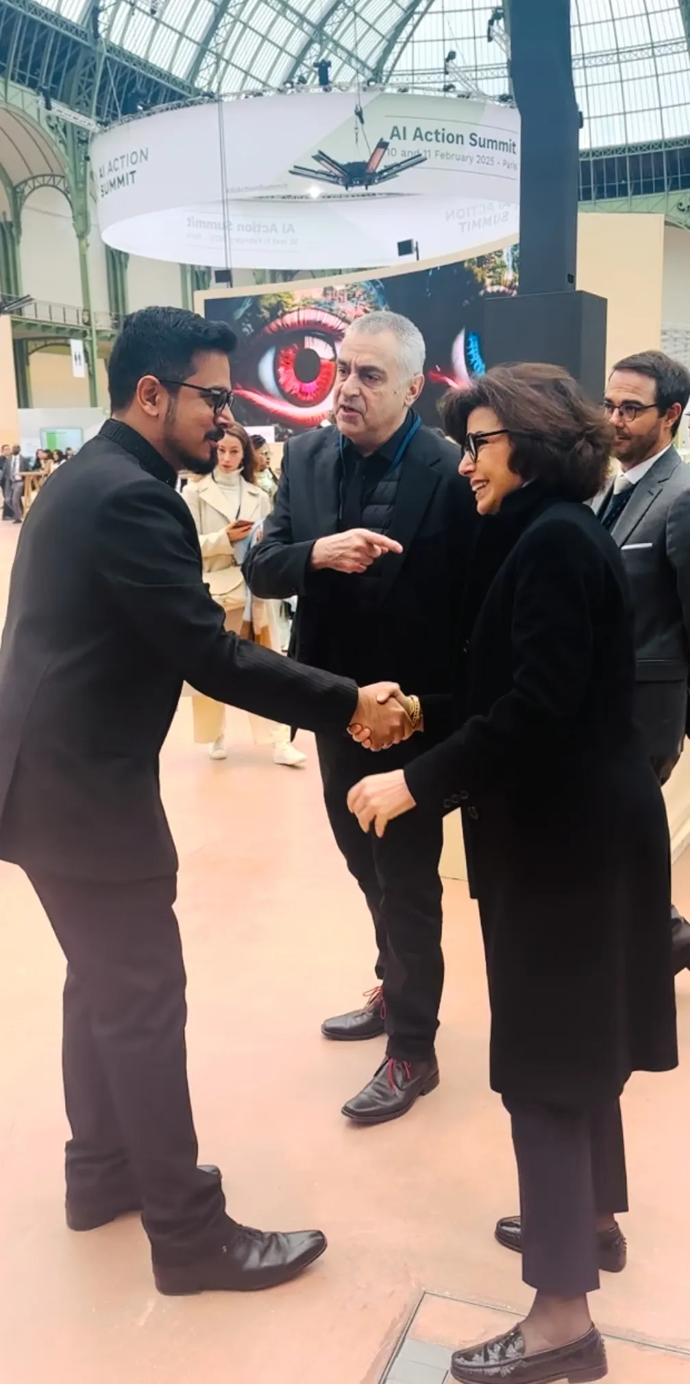 Minister of Culture Rachida Dati congratulating Fabin for his exhibition at AI Action Summit 2025